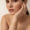 Luxury look artificial gold bangles for women, perfect for stacking.