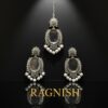 Elegant RAGNISH Heritage Bridal Set featuring ornate maang tikka and matching statement earrings.