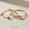 RAGNISH luxury gold adjustable bangle set (Pack of 2) with pave cubic zirconia spheres.