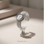 RAGNISH Luminary Cuff Watch with crystal-set band and pearl drop charm product photo.