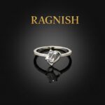 RAGNISH Embrace rhodium-plated adjustable ring with baguette cut cubic zirconia center stone.